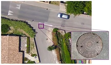 Software detection of a sewer plate.