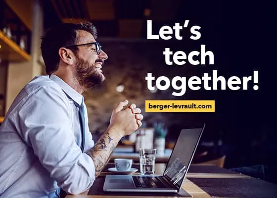 Happy man behind his laptop. Let's tech together! berger-levrault.com