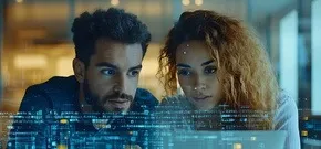 Un homme et un femme utilisent une IA responsable.